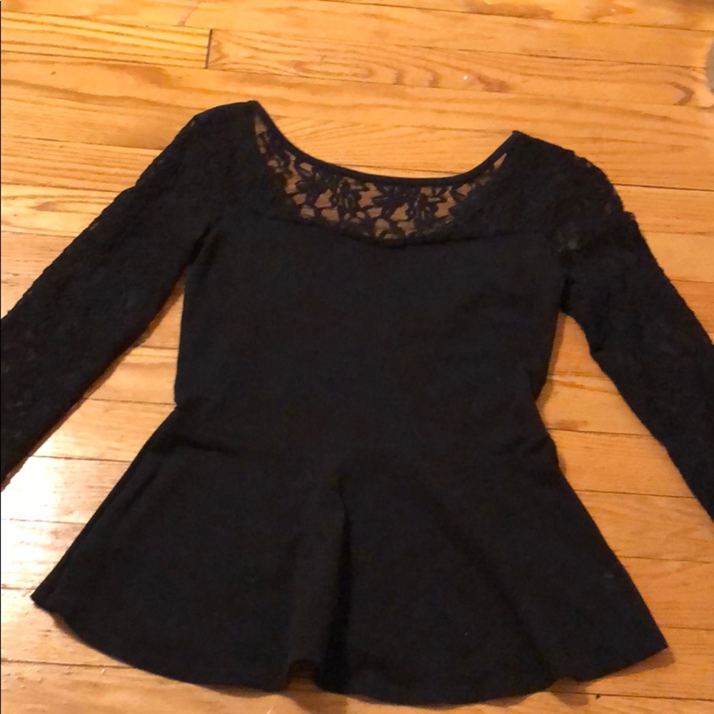 Black scoop neck and back peplum top